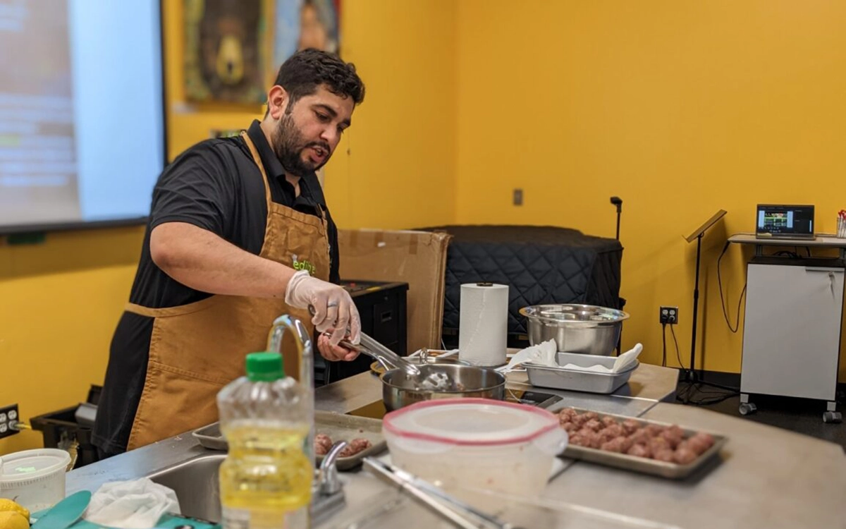 Man giving cooking presentation