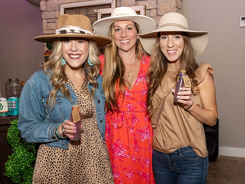 3 women at Mad Hatter Tea Party