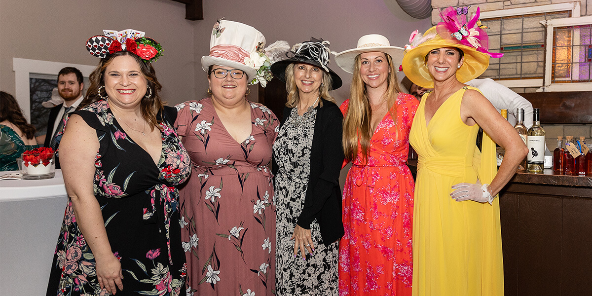 Five guests at the Mad Hatter Tea Party